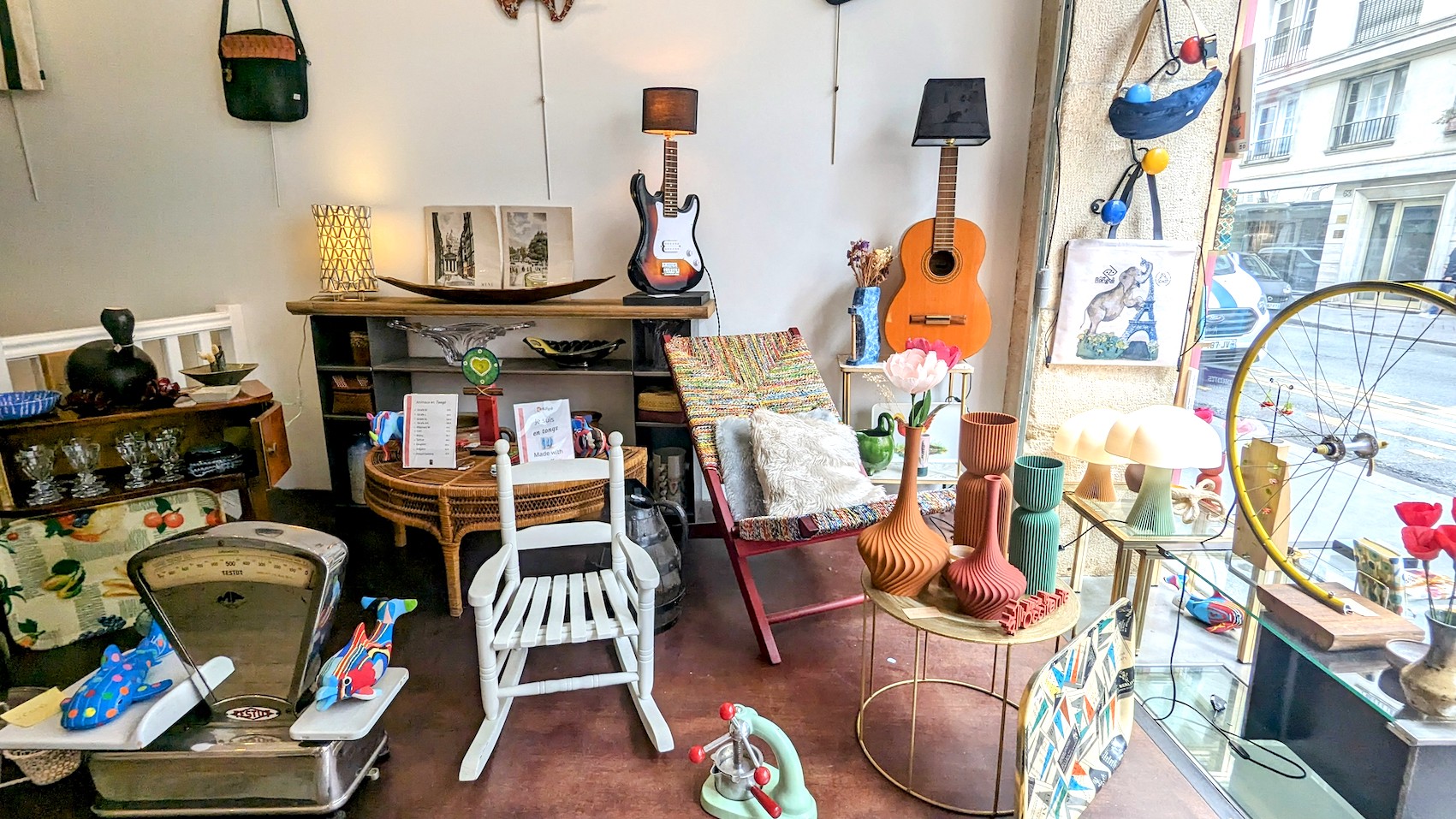 The sustainable products such as recycled guitar lamps and flip flop animals in the Rue Rangoli boutique in Paris.