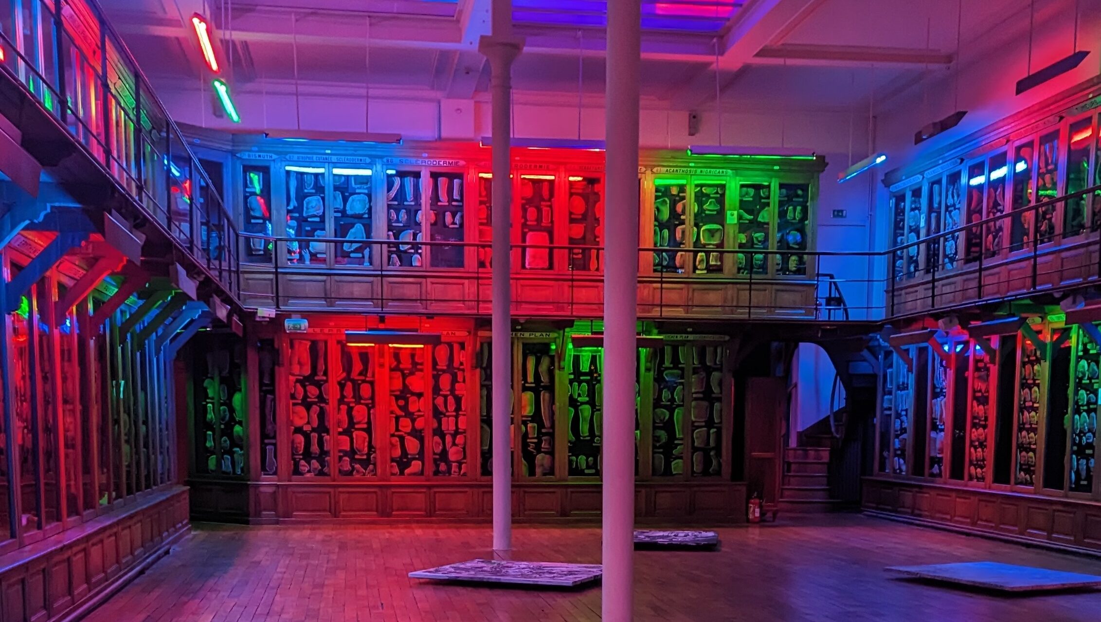 The artist duo 'The Bells Angels' has installed lights, sounds and images in the Musée des Moulages in Paris, drenching the room in a creepy red, blue and green light.