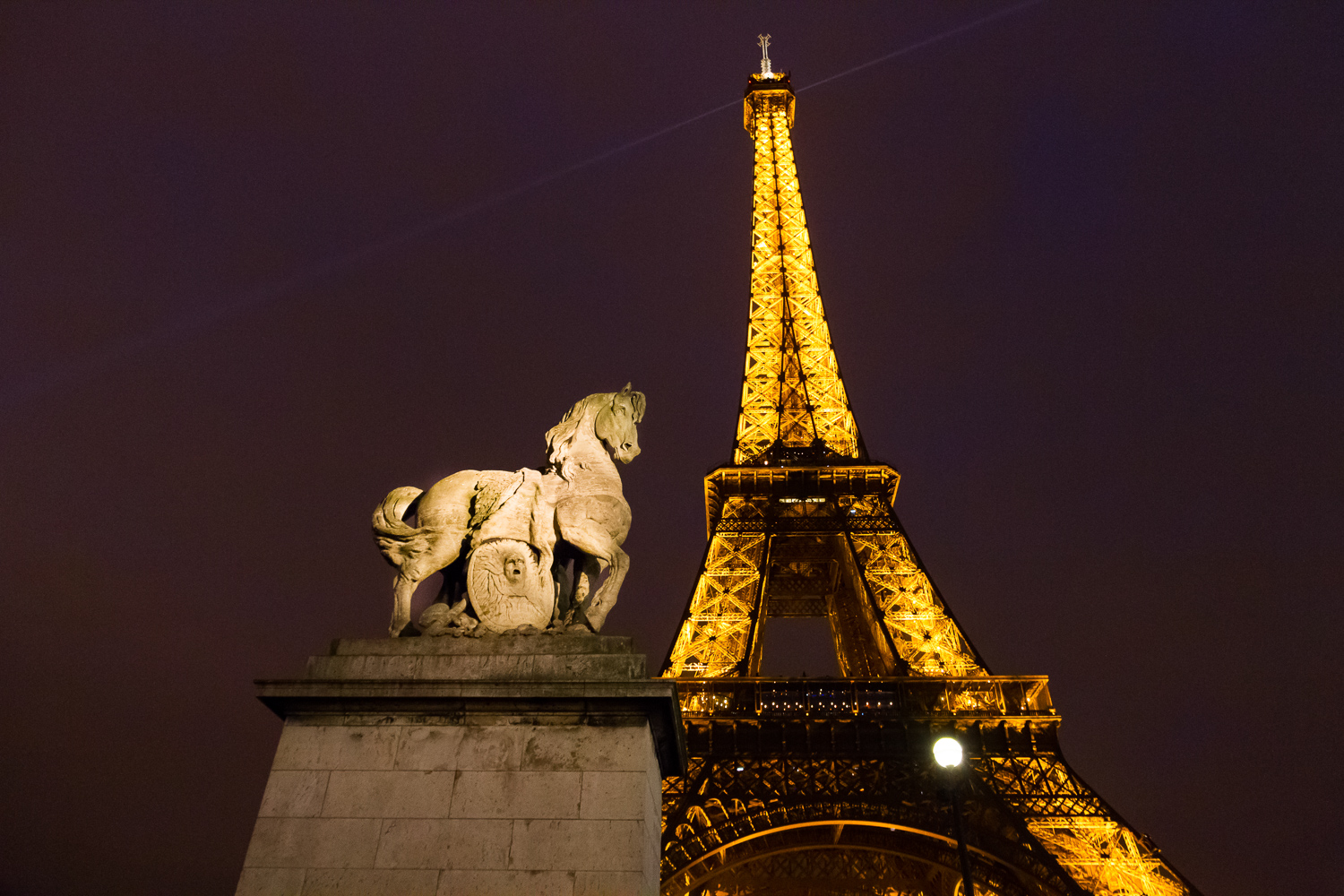 The Eiffel Tower by night.