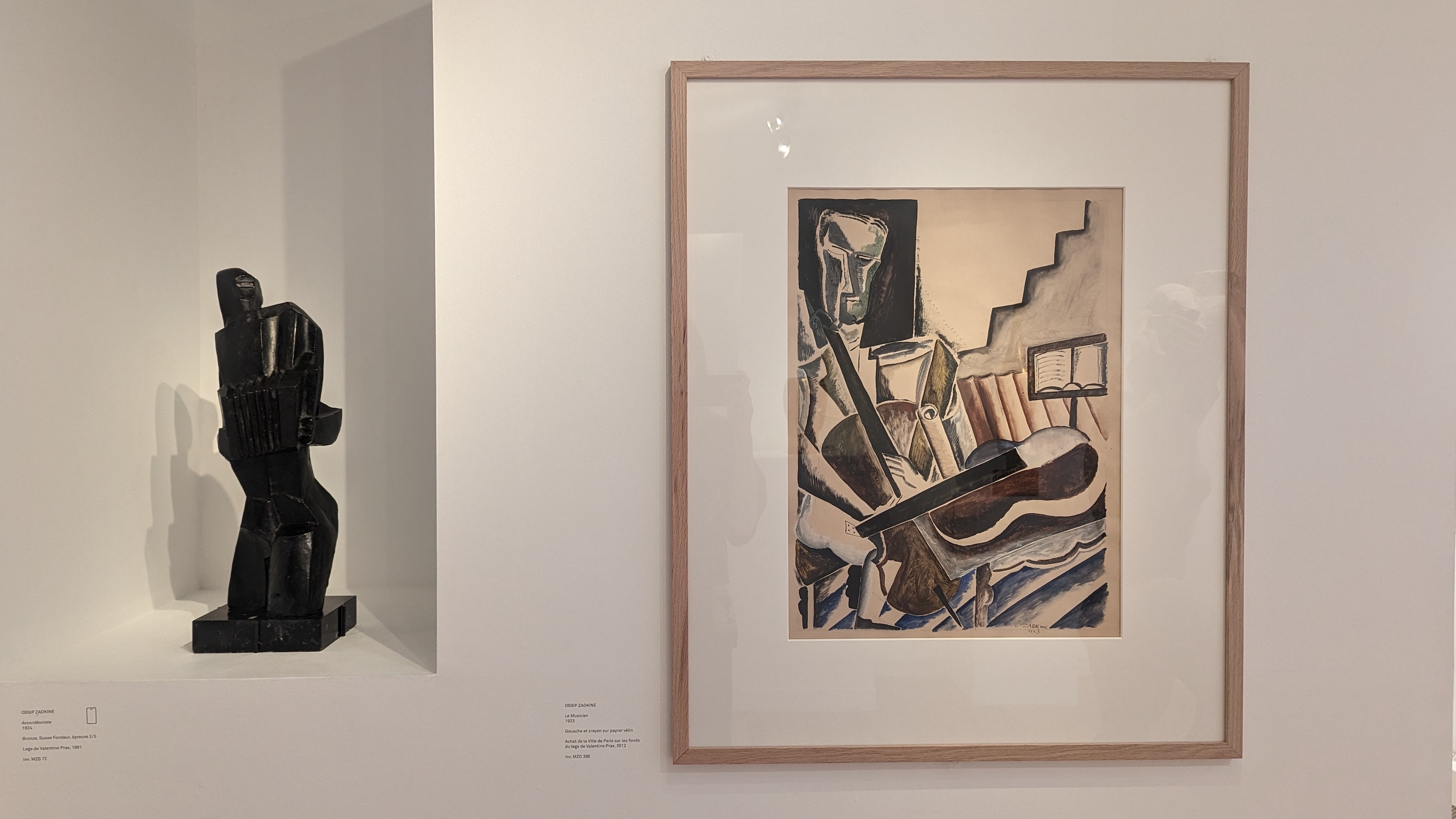 A sculpture and painting by Ossip Zadkine exhibited in the Zadkine Museum in Paris, which can be visited for free.