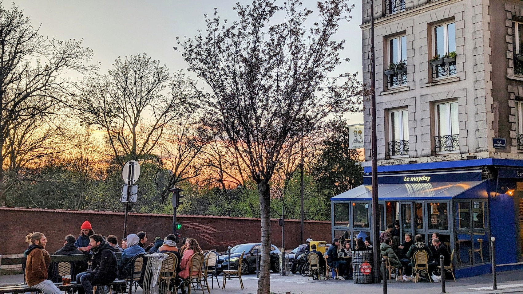 Inhabitants of the 18th arrondissement gather in a popular cafe in the Lamarck-Caulaincourt neighborhood.