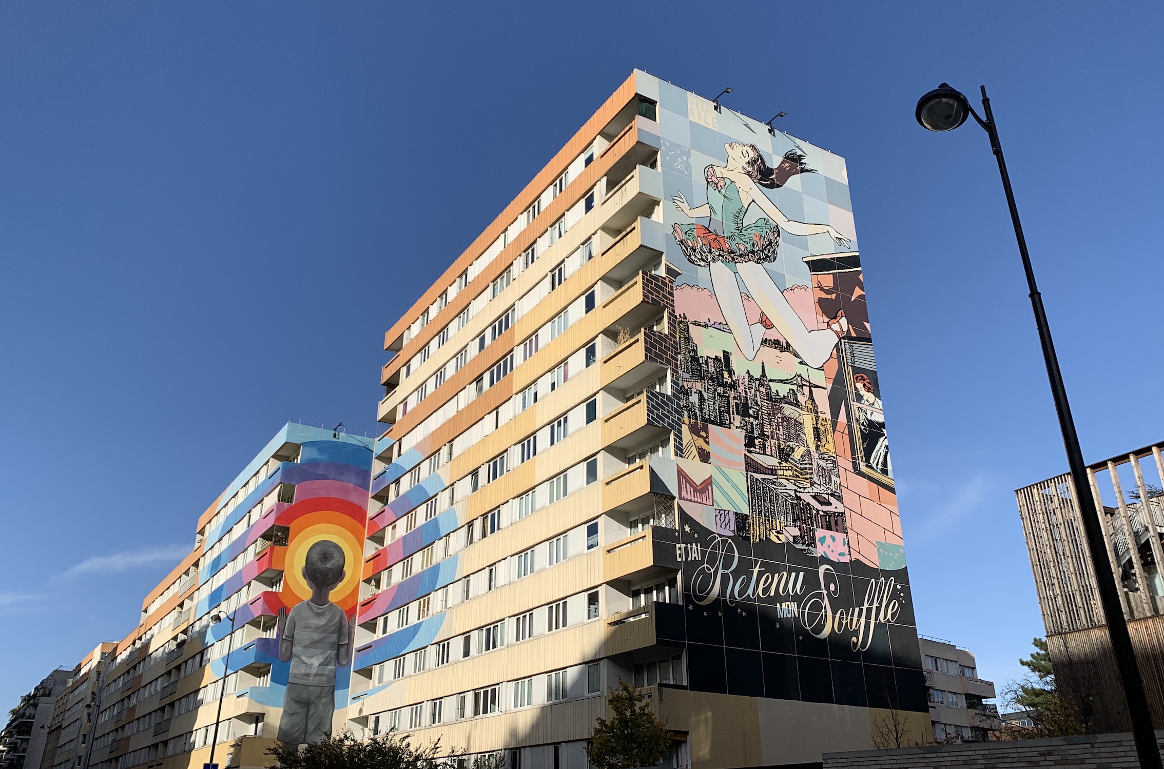 Colorful murals on two modern buildings in the 13th arrondissement in Paris.