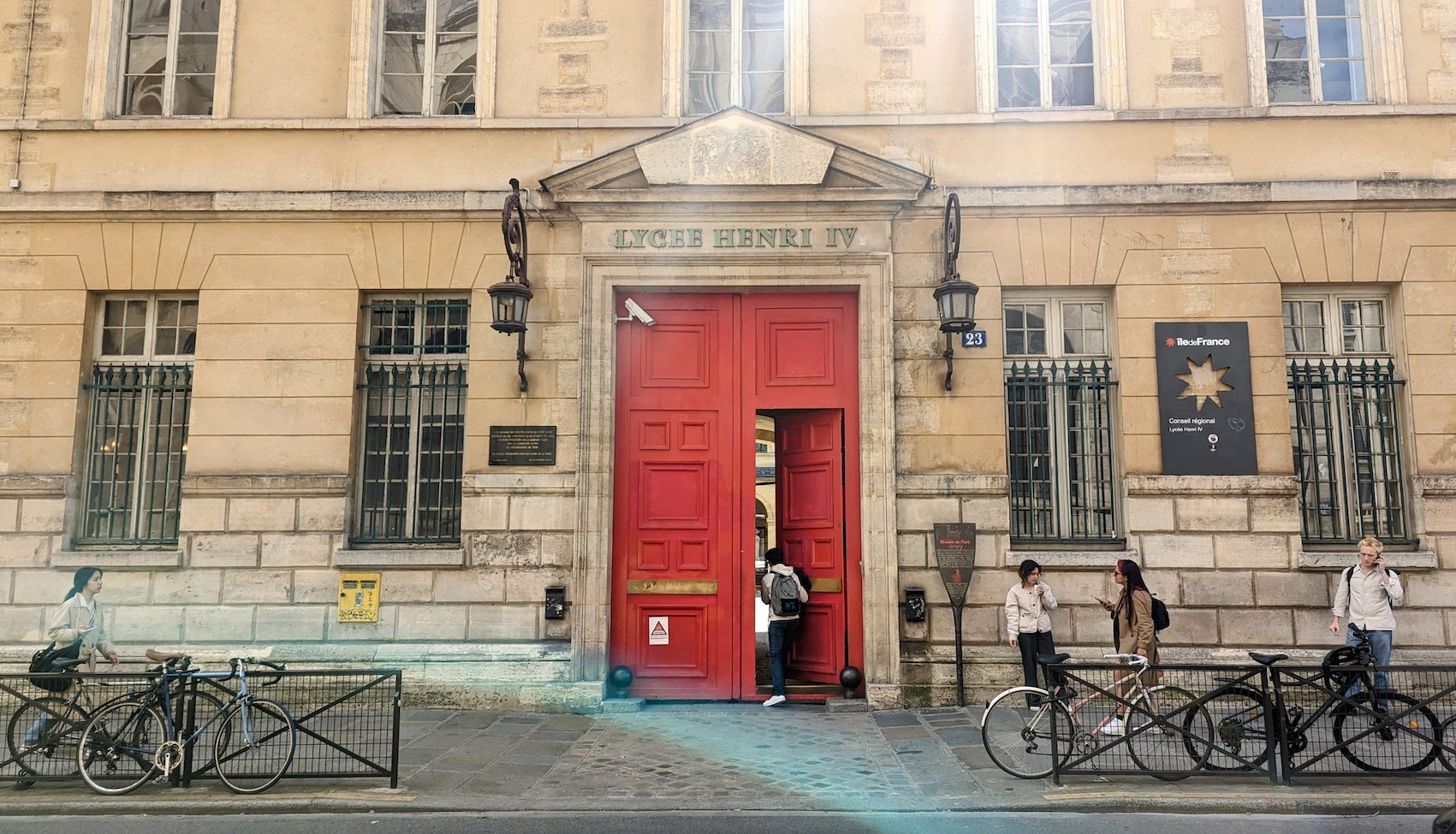 The red entry door of the Lycée Henry IV school in the 5th arrondissement in Paris, which was featured in the French cult movie La Boum.