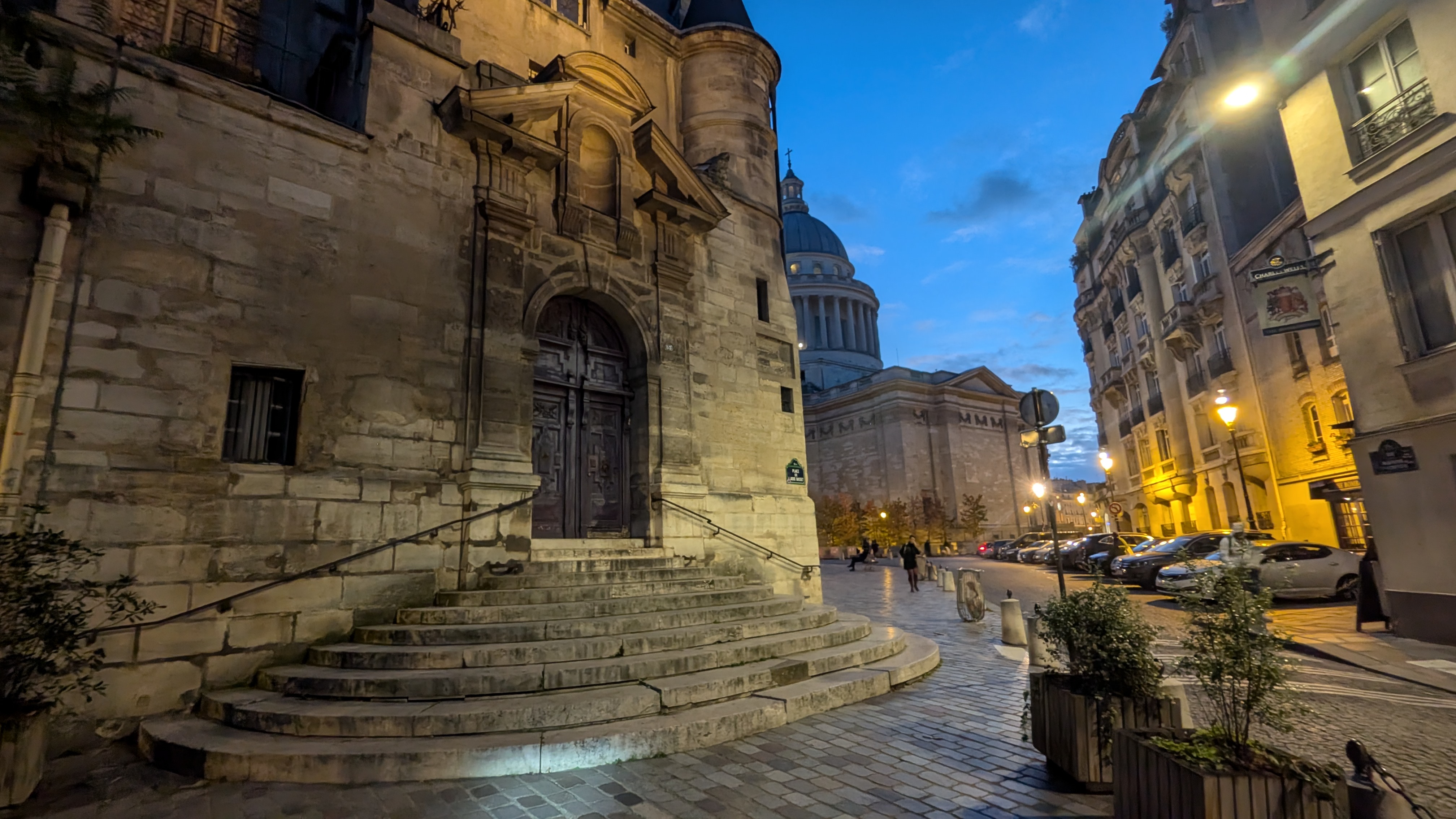 The steps of Saint-Etienne-du-Mont at dusk, the exact location where Owen Wilson sits as the vintage Peugeot arrives in the movie "Midnight in Paris".